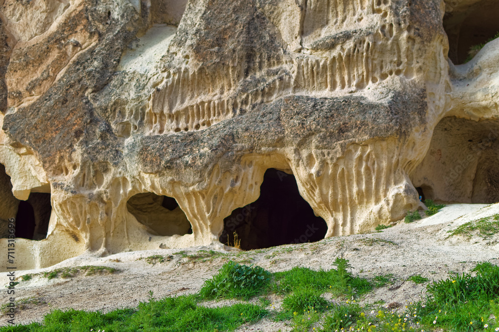 Typical Cappadocia landscape soft volcanic rock, shaped by erosion in Goreme, Turkey.