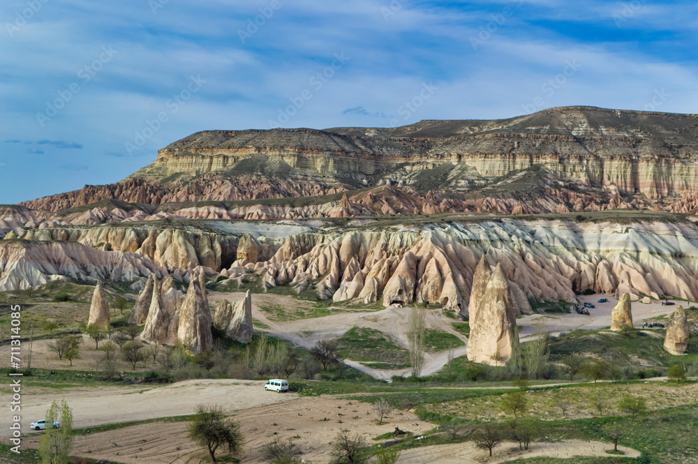 Typical Cappadocia landscape soft volcanic rock, shaped by erosion in Goreme, Turkey.