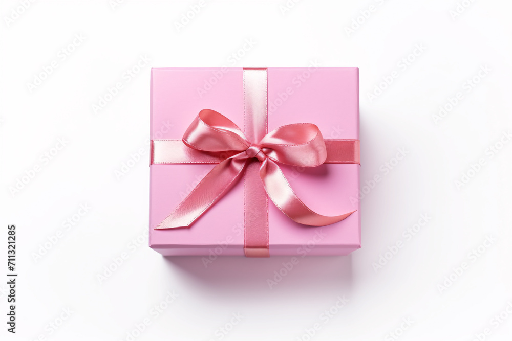 Top view of pink gift box with ribbon on white background Top view of pink gift box with ribbon on white background