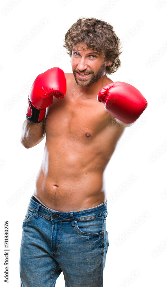 Handsome hispanic boxer man wearing boxing gloves over isolated background with a happy and cool smile on face. Lucky person. Handsome hispanic boxer man wearing boxing gloves over isolated background with a happy and cool smile on face. Lucky person.