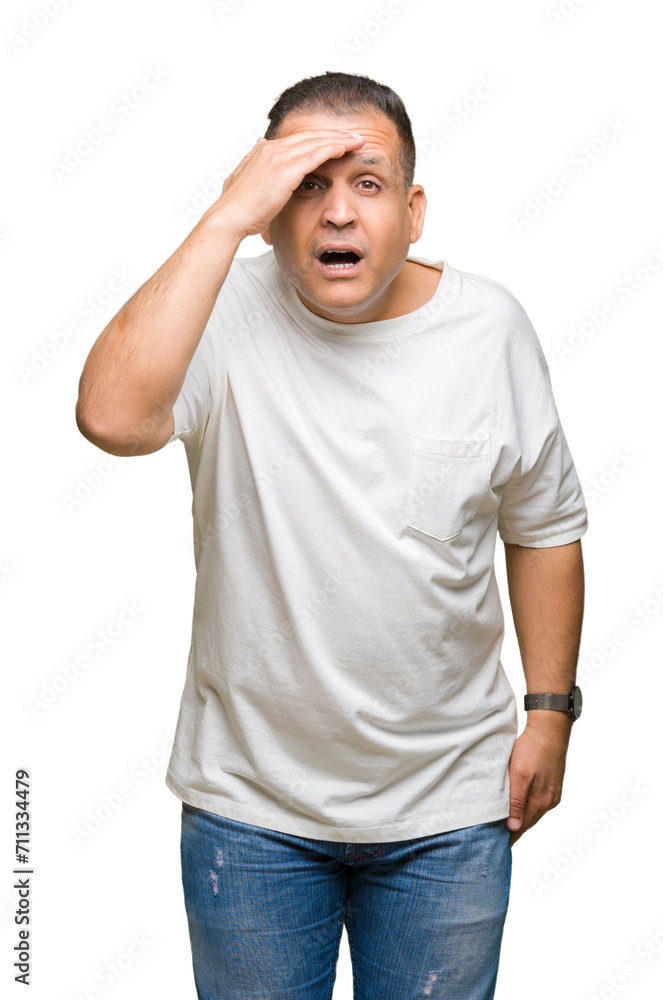 Middle age arab man wearig white t-shirt over isolated background very happy and smiling looking far away with hand over head. Searching concept. Middle age arab man wearig white t-shirt over isolated background very happy and smiling looking far away with hand over head. Searching concept.