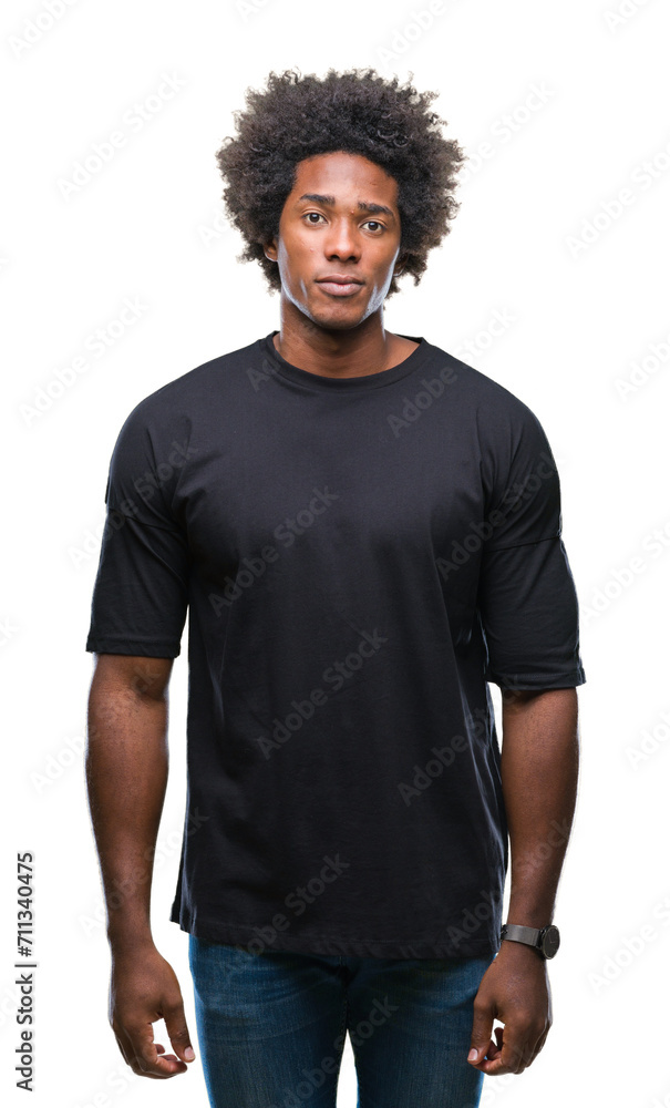 Afro american man over isolated background with serious expression on face. Simple and natural looking at the camera. Afro american man over isolated background with serious expression on face. Simple and natural looking at the camera.