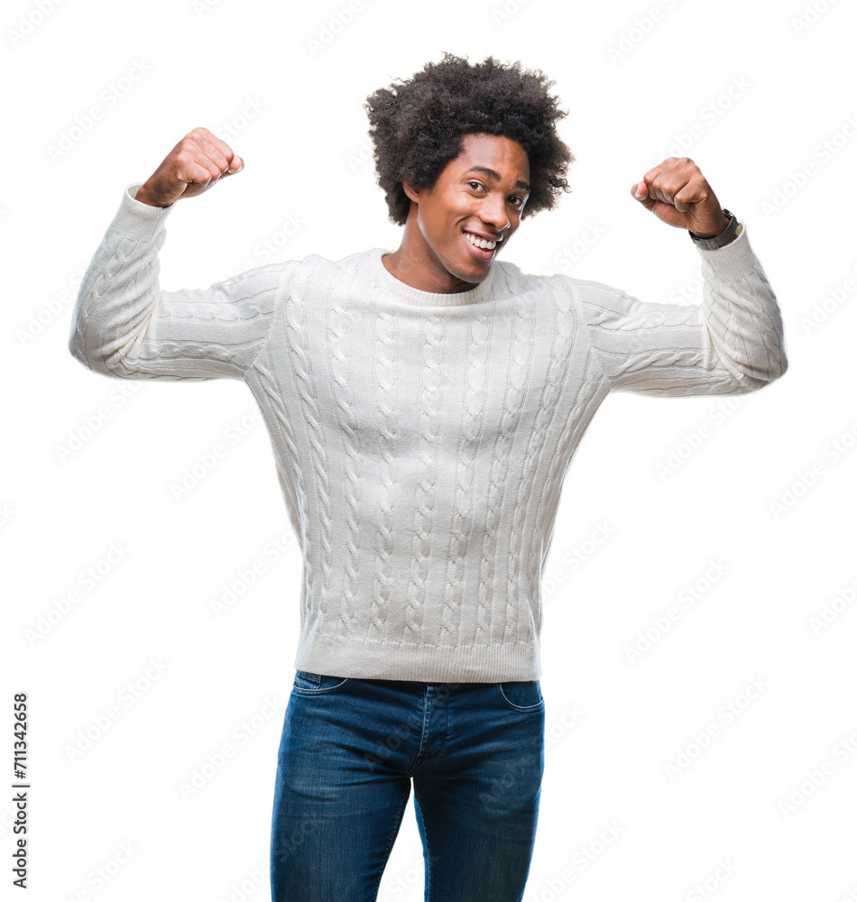 Afro american man over isolated background showing arms muscles smiling proud. Fitness concept. Afro american man over isolated background showing arms muscles smiling proud. Fitness concept.