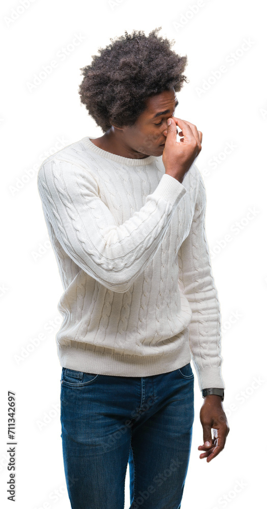 Afro american man over isolated background tired rubbing nose and eyes feeling fatigue and headache. Stress and frustration concept. Afro american man over isolated background tired rubbing nose and eyes feeling fatigue and headache. Stress and frustration concept.