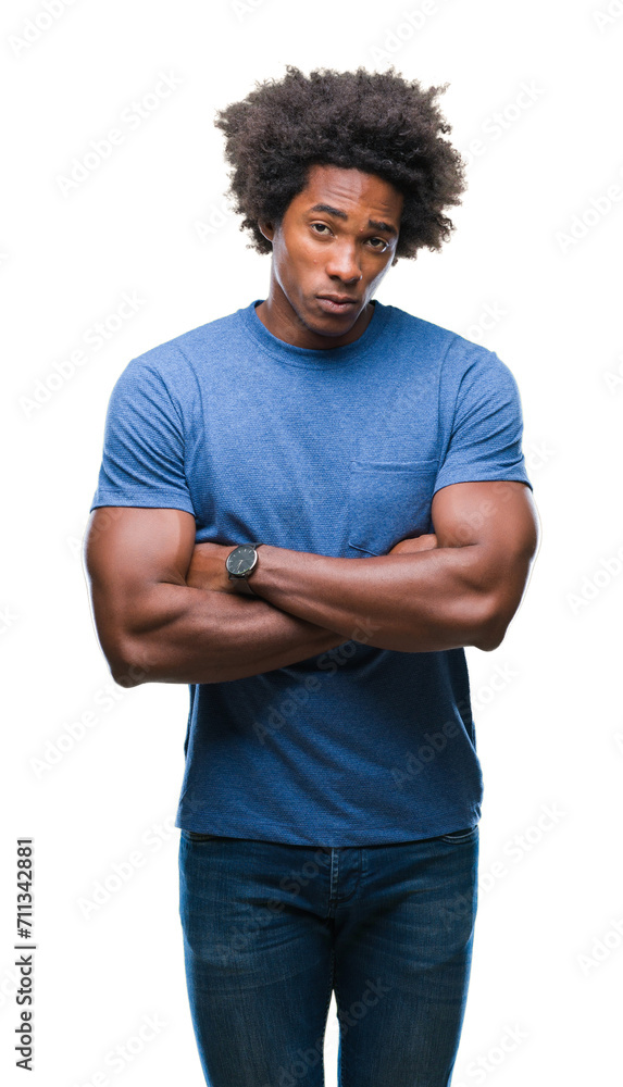 Afro american man over isolated background skeptic and nervous, disapproving expression on face with crossed arms. Negative person. Afro american man over isolated background skeptic and nervous, disapproving expression on face with crossed arms. Negative person.