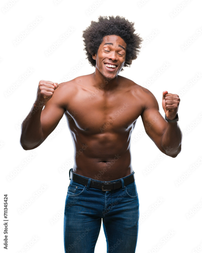 Afro american shirtless man showing nude body over isolated background excited for success with arms raised celebrating victory smiling. Winner concept. Afro american shirtless man showing nude body over isolated background excited for success with arms raised celebrating victory smiling. Winner concept.