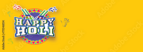 Sticker Style Happy Holi Text with Splashing Color Guns (Pichkari) and Handprints on Chrome Yellow Background. Advertising Banner or Header Design. photo