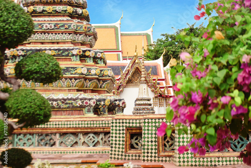 Wat Pho Temple of Thailand Bangkok Beautiful Garden with Blue Sky and Colorful Tree