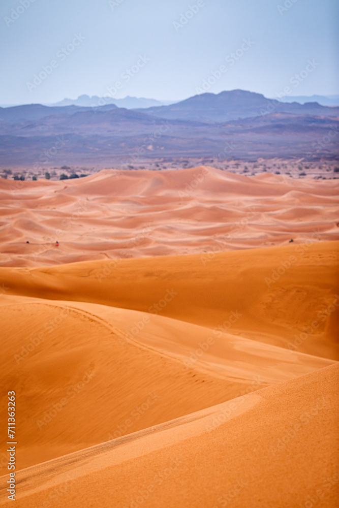 Fototapeta premium Colorful desert dunes with beautiful background in Sahara, Merzouga, Morocco