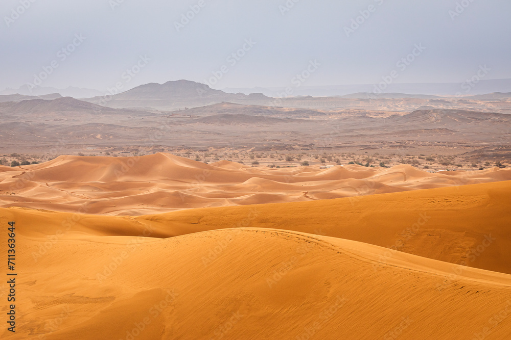 Colorful desert dunes with beautiful background in Sahara, Merzouga, Morocco