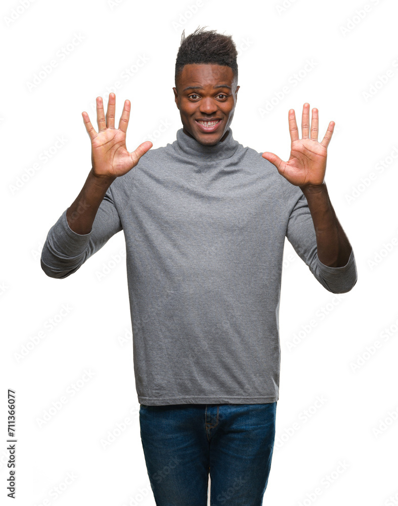 Young african american man over isolated background showing and pointing up with fingers number ten while smiling confident and happy. Young african american man over isolated background showing and pointing up with fingers number ten while smiling confident and happy.