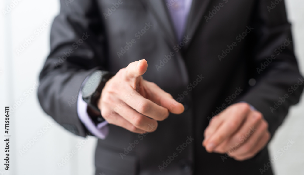 businessman touching an imaginary screen with clipping path isolated on white background