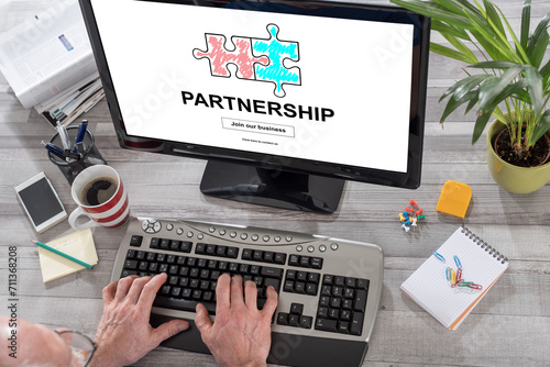 Partnership concept on a computer
