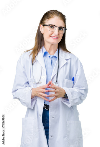 Middle age mature doctor woman wearing medical coat over isolated background Hands together and fingers crossed smiling relaxed and cheerful. Success and optimistic