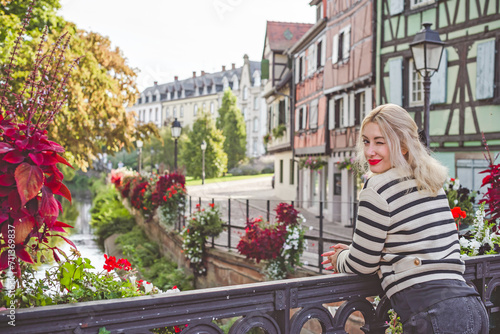 Vacation in France. Concept of tourism and holidays. Woman in city scene