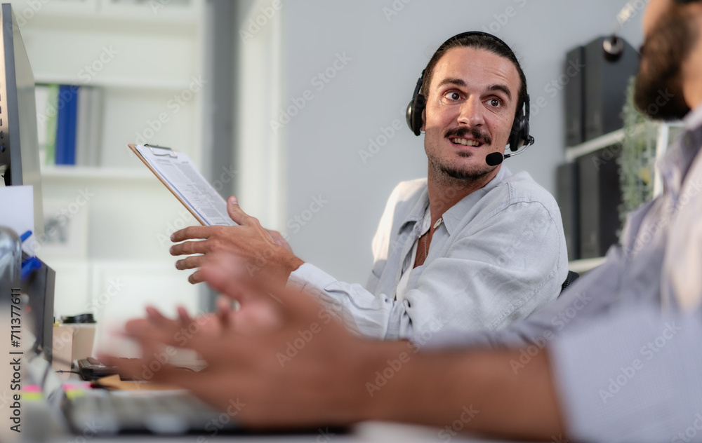 Customer service operator team wear headset working at call center to support client with telemarketing technology. Corporate sale contact agent using microphone talking to client at help desk center Customer service operator team wear headset working at call center to support client with telemarketing technology. Corporate sale contact agent using microphone talking to client at help desk center