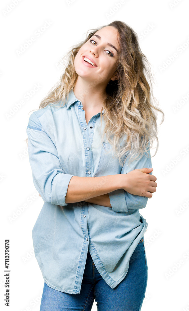 Beautiful young blonde woman over isolated background happy face smiling with crossed arms looking at the camera. Positive person. Beautiful young blonde woman over isolated background happy face smiling with crossed arms looking at the camera. Positive person.