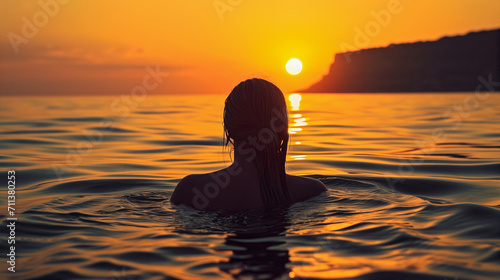 woman in a lake during sunset  panoramic landscape tranquil atmosphere female silhouette outdoors