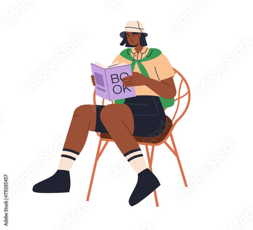 Young character reading, holding paper book in hands, sitting in chair. Reader with literature at leisure time. Female student studying textbook. Flat vector illustration isolated on white background