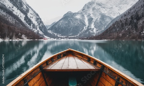 Serene Lake View From Wooden Boat Amidst Snowy Mountains