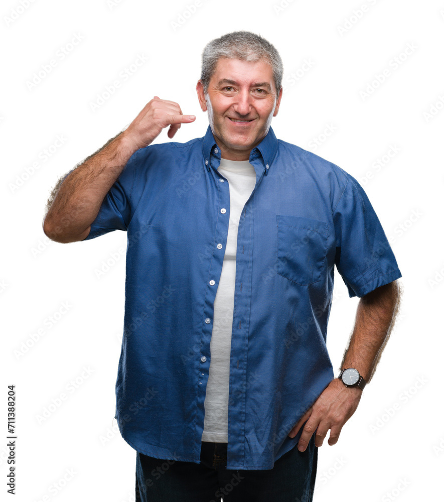Handsome senior man over isolated background smiling doing phone gesture with hand and fingers like talking on the telephone. Communicating concepts. Handsome senior man over isolated background smiling doing phone gesture with hand and fingers like talking on the telephone. Communicating concepts.