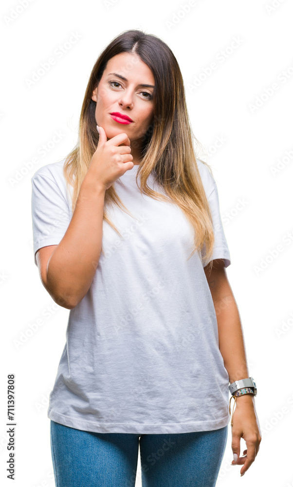 Young beautiful woman casual white t-shirt over isolated background looking confident at the camera with smile with crossed arms and hand raised on chin. Thinking positive. Young beautiful woman casual white t-shirt over isolated background looking confident at the camera with smile with crossed arms and hand raised on chin. Thinking positive.