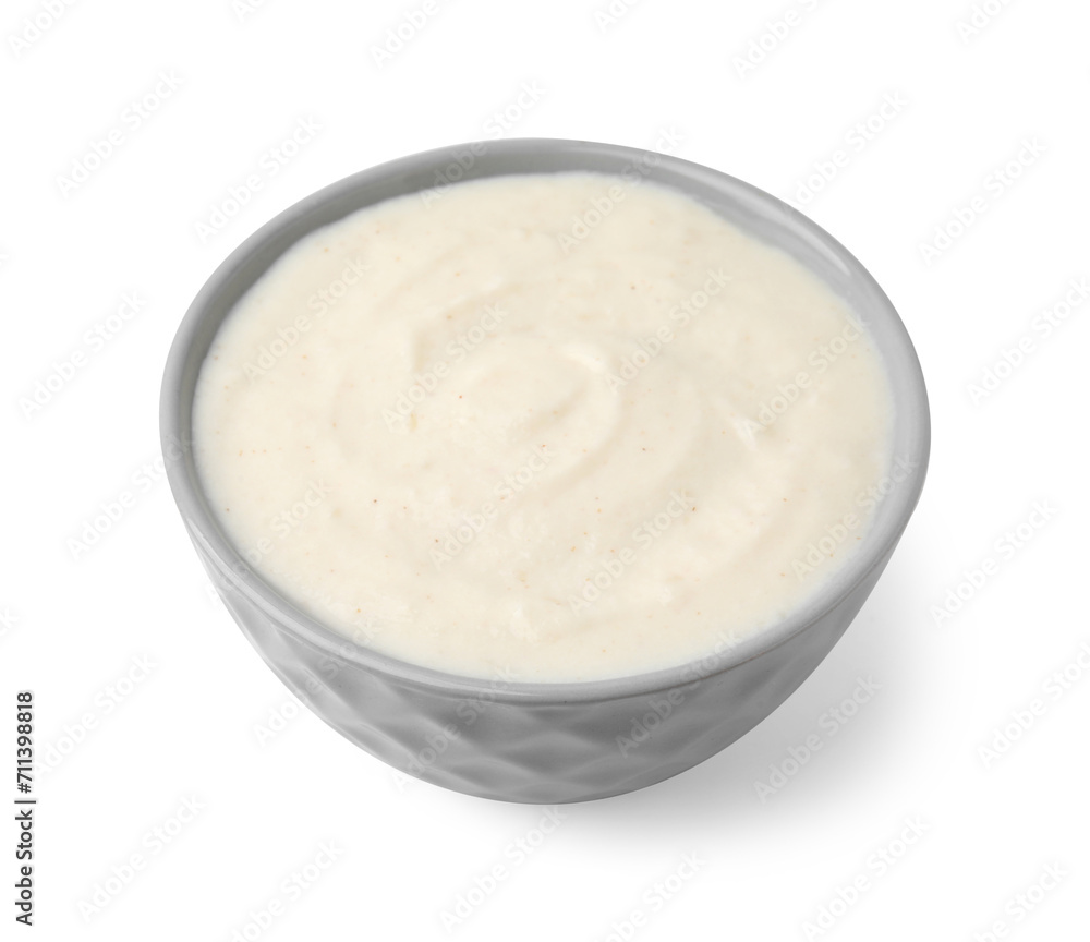 Delicious semolina pudding in bowl isolated on white Delicious semolina pudding in bowl isolated on white