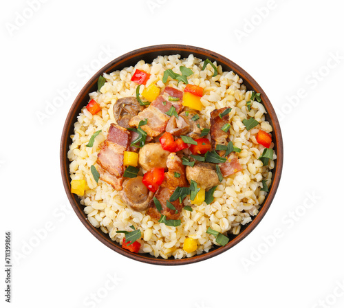 Cooked bulgur with vegetables, fried bacon and mushrooms in bowl isolated on white, top view