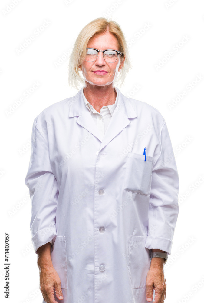 Middle age blonde therapist woman wearing white coat over isolated background with serious expression on face. Simple and natural looking at the camera. Middle age blonde therapist woman wearing white coat over isolated background with serious expression on face. Simple and natural looking at the camera.