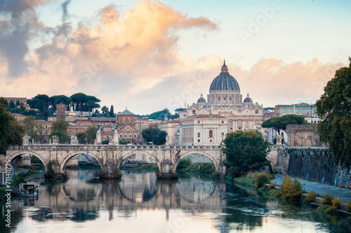 Beautiful colorful morning view of Rome Skyline with the famous Vatican Saint Peter Basilica and Saint Angelo Bridge above Tiber River in Rome, Italy..