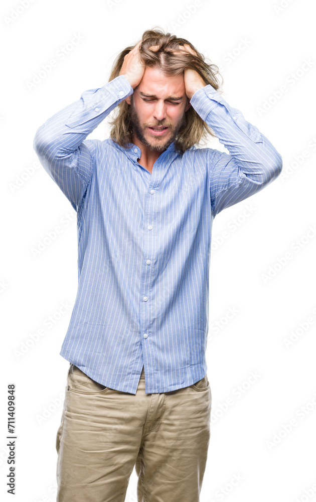 Young handsome man with long hair over isolated background suffering from headache desperate and stressed because pain and migraine. Hands on head. Young handsome man with long hair over isolated background suffering from headache desperate and stressed because pain and migraine. Hands on head.