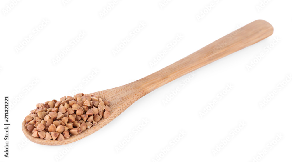 Spoon with raw buckwheat isolated on white Spoon with raw buckwheat isolated on white