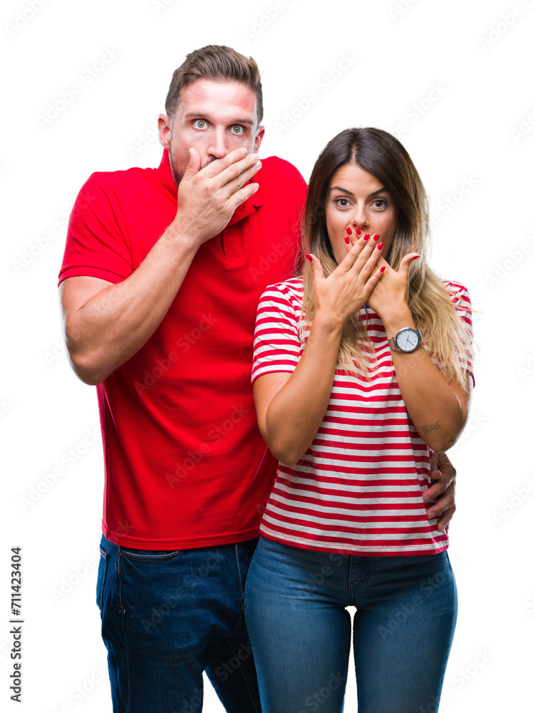 Young couple in love over isolated background shocked covering mouth with hands for mistake. Secret concept. Young couple in love over isolated background shocked covering mouth with hands for mistake. Secret concept.