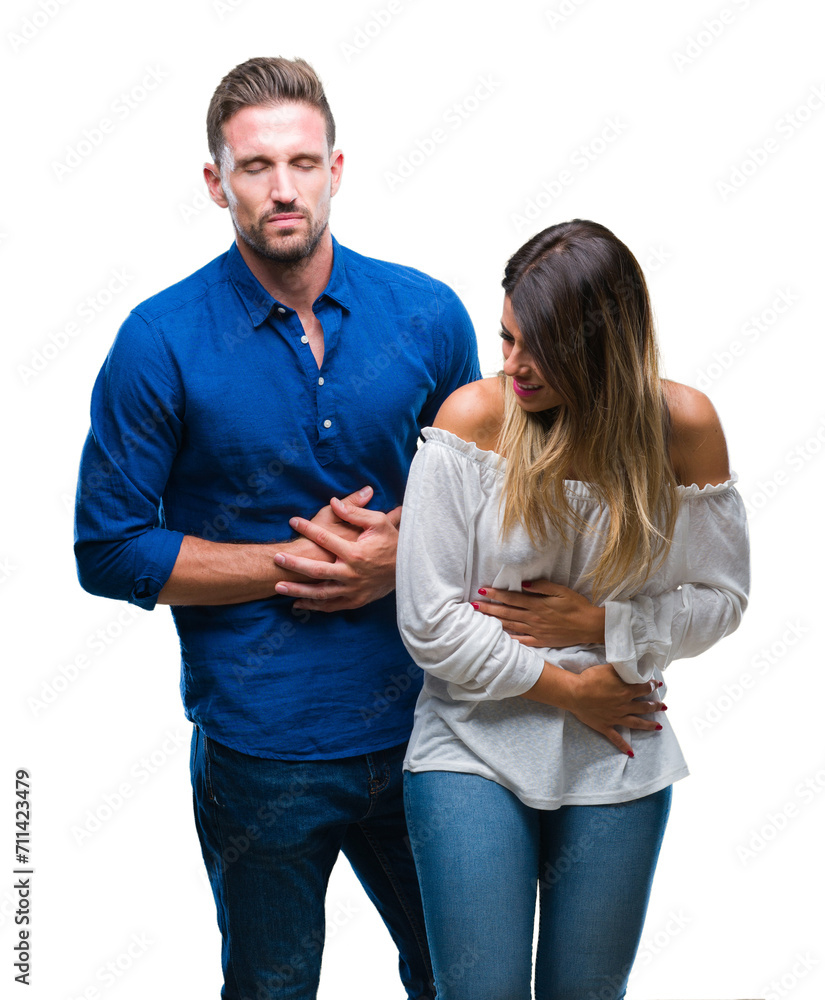 Young couple in love over isolated background with hand on stomach because nausea, painful disease feeling unwell. Ache concept. Young couple in love over isolated background with hand on stomach because nausea, painful disease feeling unwell. Ache concept.
