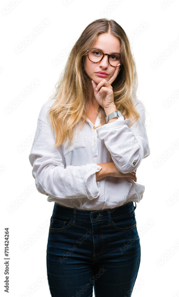 Young beautiful blonde business woman wearing glasses over isolated background thinking looking tired and bored with depression problems with crossed arms. Young beautiful blonde business woman wearing glasses over isolated background thinking looking tired and bored with depression problems with crossed arms.