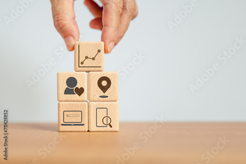 Online shopping concept with online business icon on wooden cube Online sales business growth concept. Growing trend of online shopping