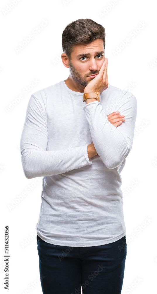 Young handsome man over isolated background thinking looking tired and bored with depression problems with crossed arms. Young handsome man over isolated background thinking looking tired and bored with depression problems with crossed arms.