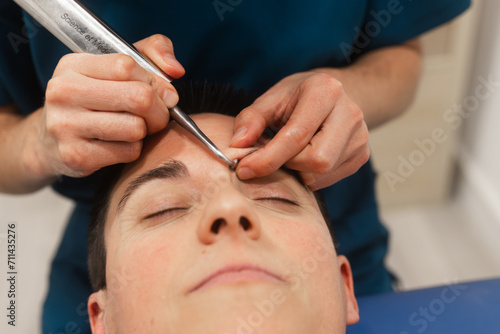 Professional Eyebrow Shaping with Precision Tweezers