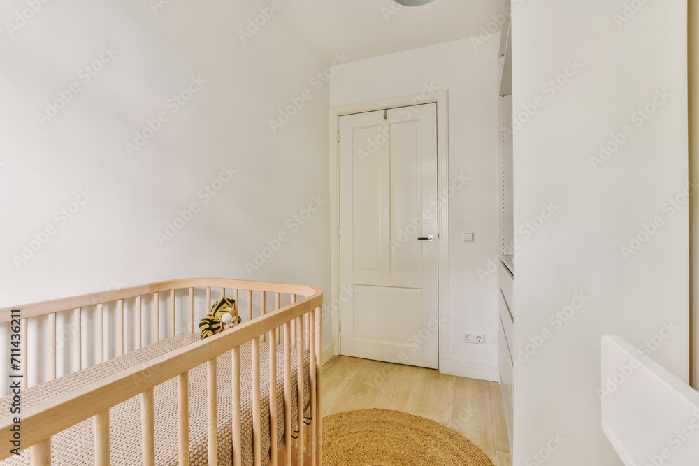 Modern nursery room with crib and minimalist decor Modern nursery room with crib and minimalist decor