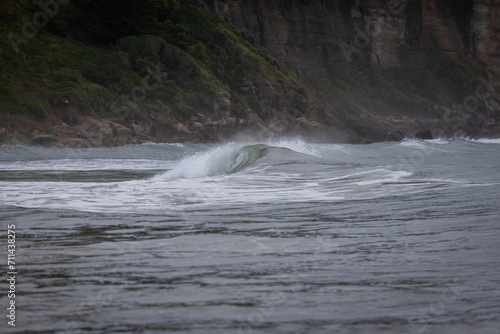 Small wave shore break on the ocean.