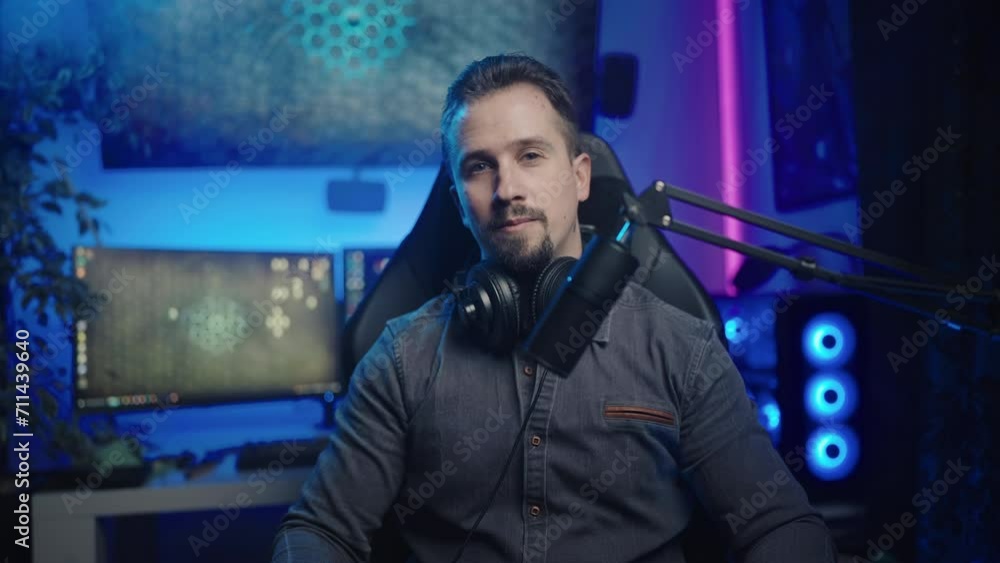 Gamer influencer interacting with fans with computer monitors in background 4K Gamer influencer interacting with fans with computer monitors in background 4K