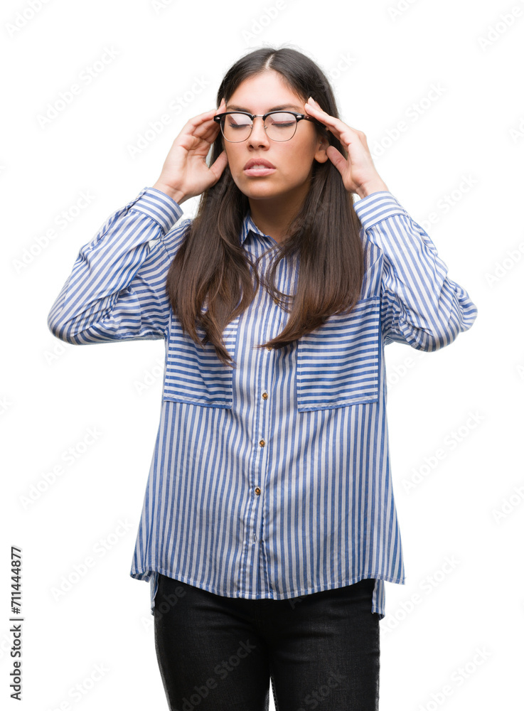 Young beautiful hispanic business woman with hand on head for pain in head because stress. Suffering migraine. Young beautiful hispanic business woman with hand on head for pain in head because stress. Suffering migraine.