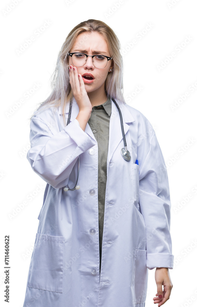 Young blonde doctor woman over isolated background touching mouth with hand with painful expression because of toothache or dental illness on teeth. Dentist concept. Young blonde doctor woman over isolated background touching mouth with hand with painful expression because of toothache or dental illness on teeth. Dentist concept.