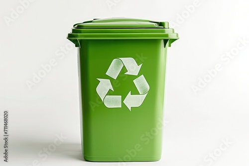 Green trash can with recycling symbol, concept of environmental preservation and Earth Day.