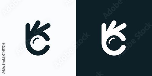 Vector logo design illustration of OK hand gesture with hidden magnifying glass shape