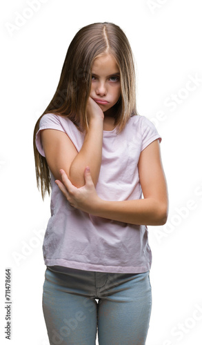 Young beautiful girl over isolated background thinking looking tired and bored with depression problems with crossed arms. © Krakenimages.com