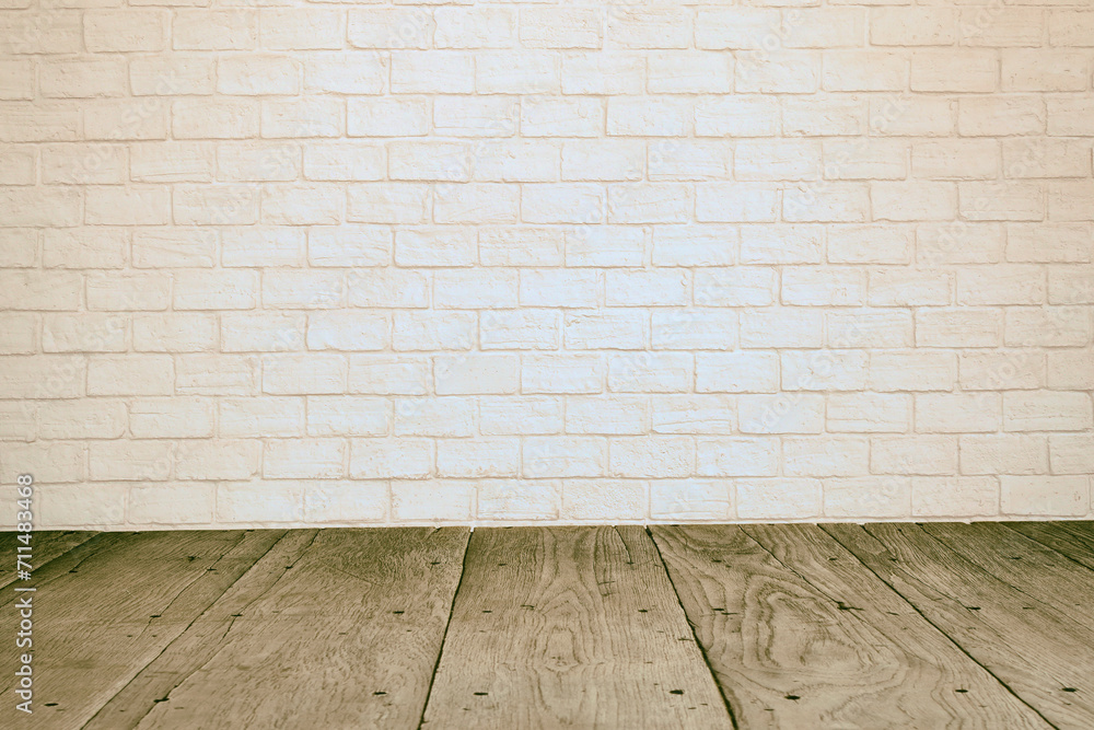 Fototapeta premium Empty room with beige brick wall and old wooden floor interior background