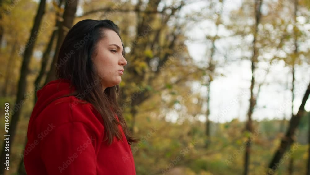 Beautiful Caucasian woman doing yoga in the autumn park. A girl meditates on a yellow leaf, a lifestyle of peace alone with nature. High quality 4k footage Beautiful Caucasian woman doing yoga in the autumn park. A girl meditates on a yellow leaf, a lifestyle of peace alone with nature. High quality 4k footage