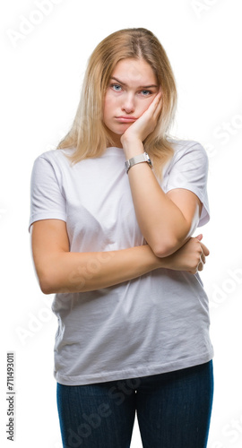 Young caucasian woman over isolated background thinking looking tired and bored with depression problems with crossed arms. © Krakenimages.com