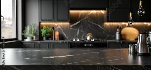 Elegant and stylish dark-toned kitchen with modern appliances and marble countertops, bathed in warm natural light